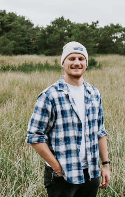 A man standing in a field.
